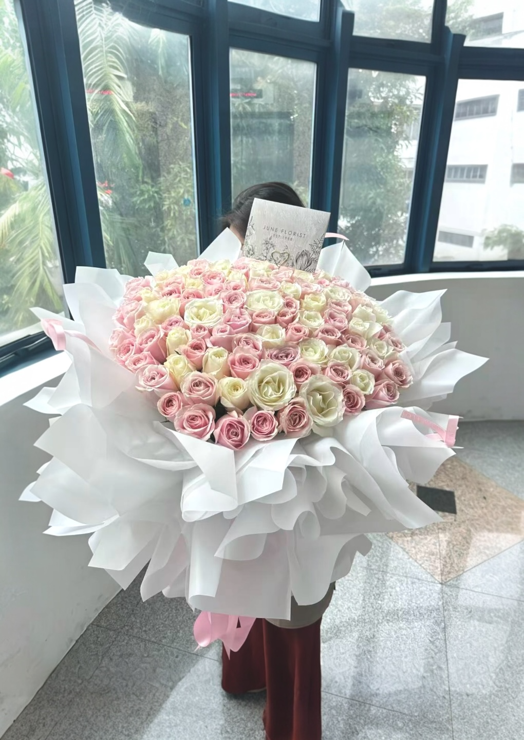 99 pink white roses