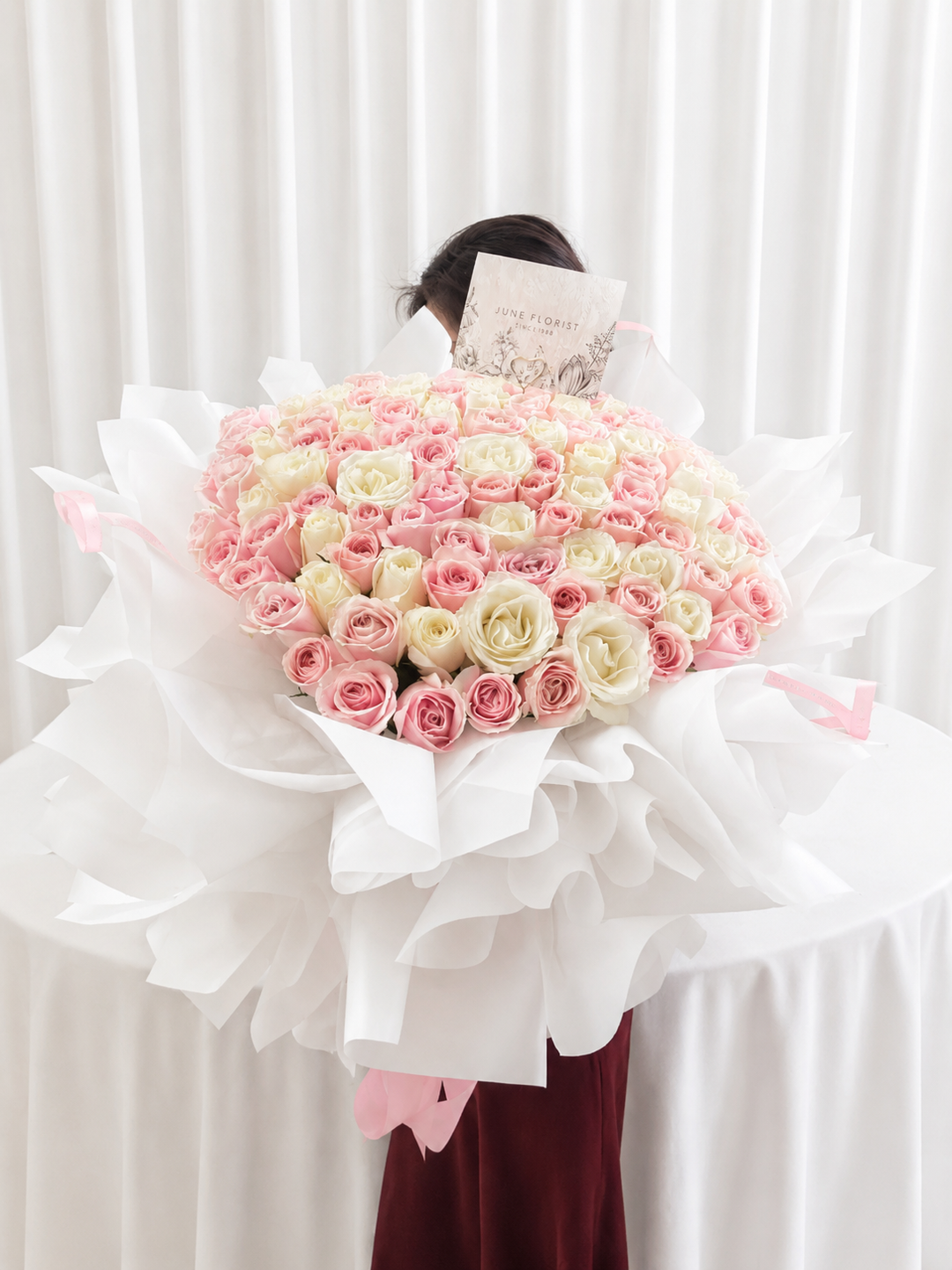 99 pink white roses