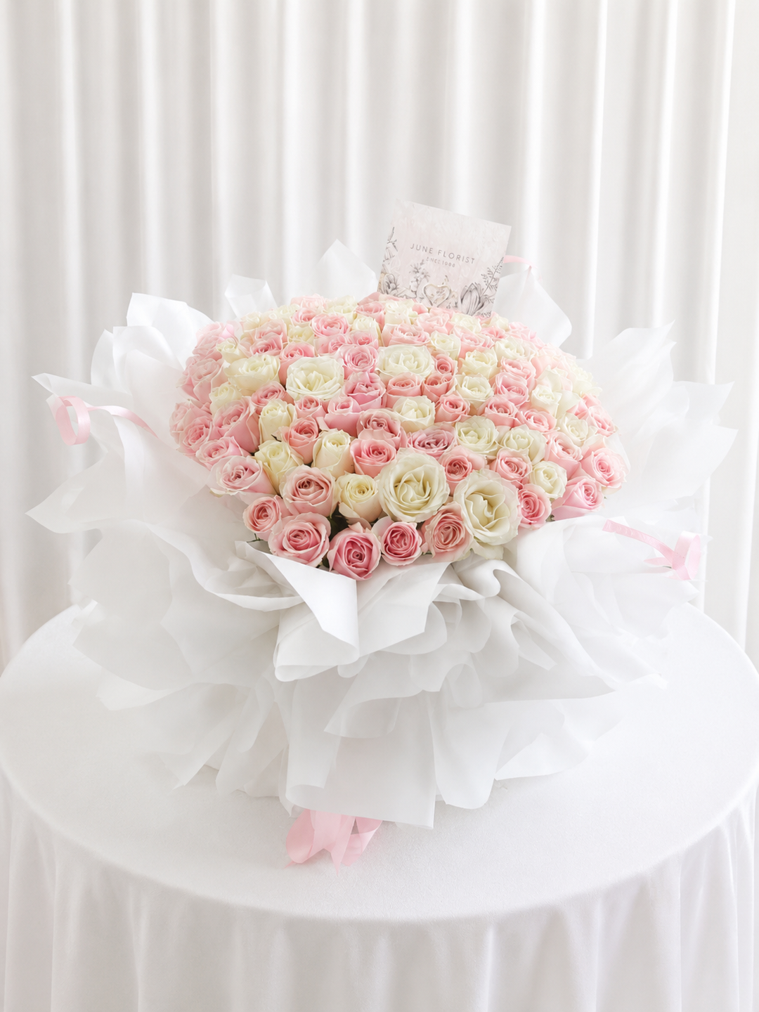 99 pink white roses