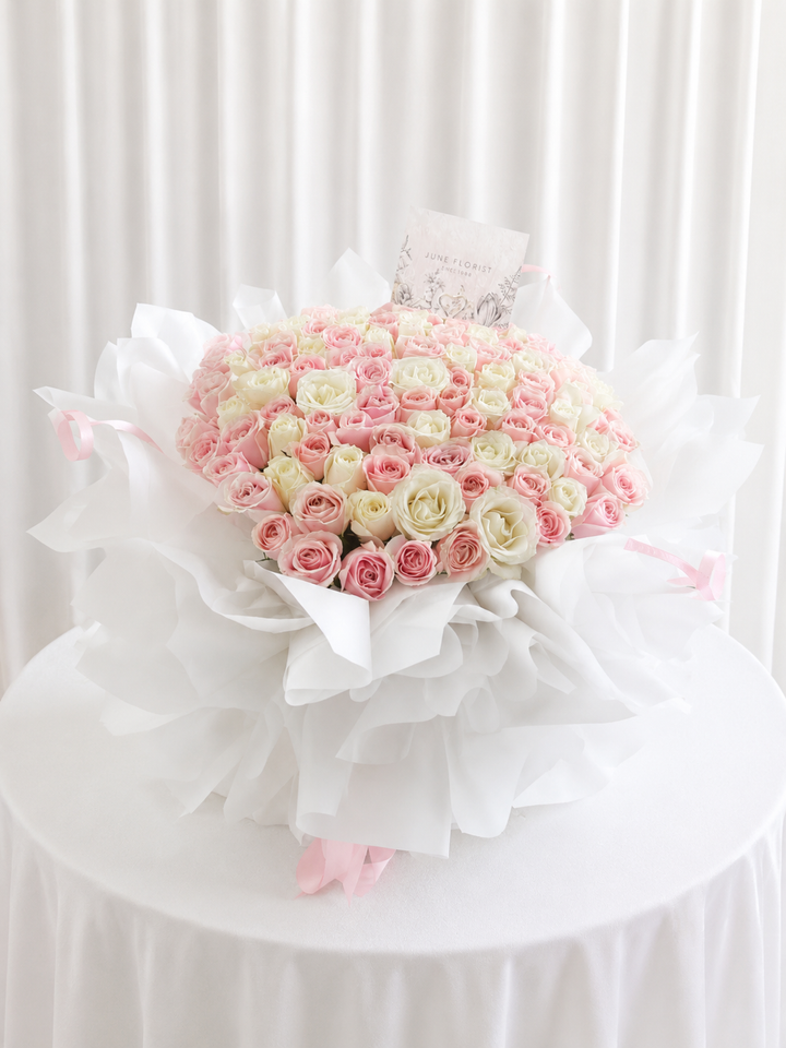 99 pink white roses