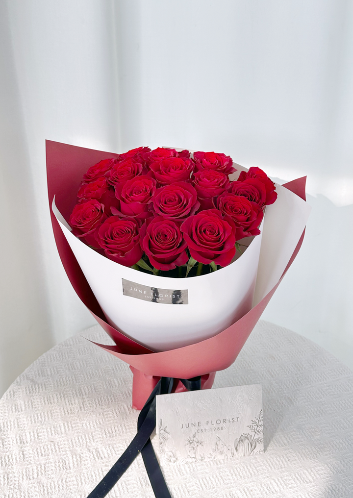 Love’s Embrace      (18 Roses)